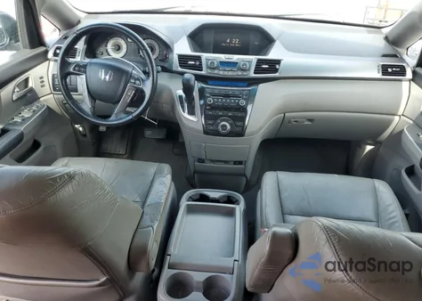 2012 Honda Odyssey Touring z USA, uszkodzony, nr VIN 5FNRL5H92CB014437